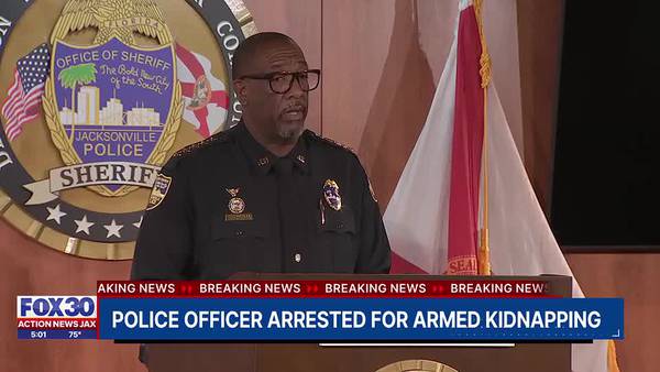 Police officer arrested for armed kidnapping