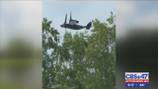 Homeowners concerned about low-flying military plane