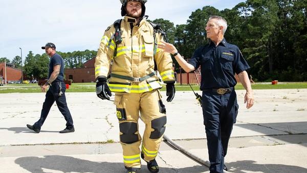 Photos: Jaguars center firefighter for the day