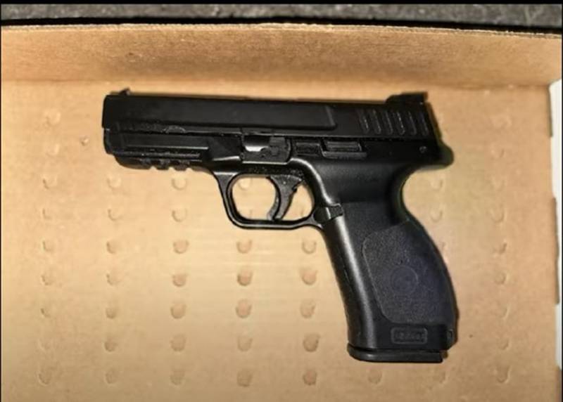 A 9MM handgun was found under the leg of the suspect.